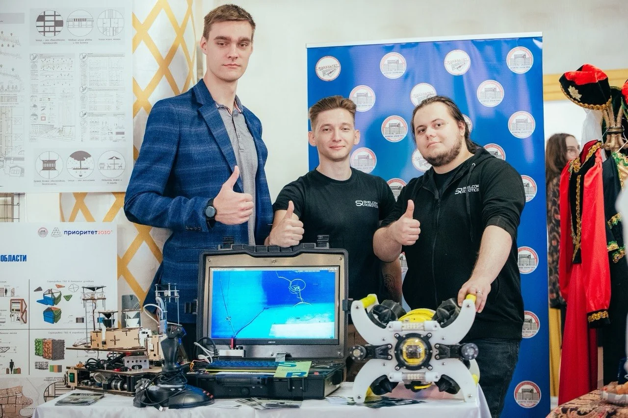 The team with the system at an industry exhibition