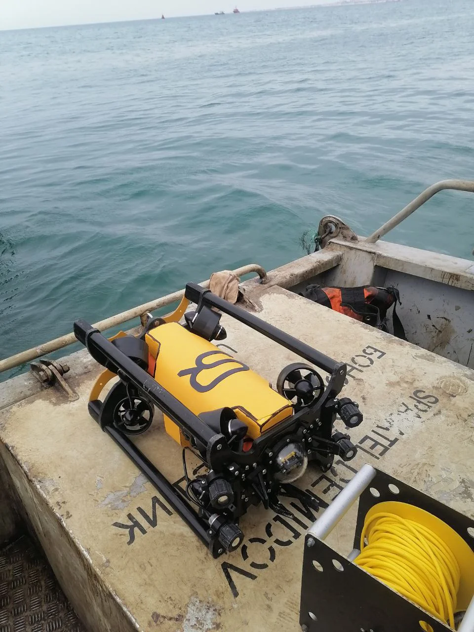 The vehicle and tether reel aboard a boat