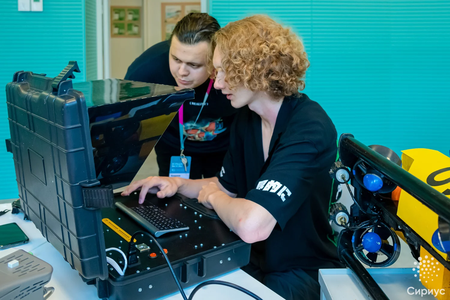 Trainees at the control station